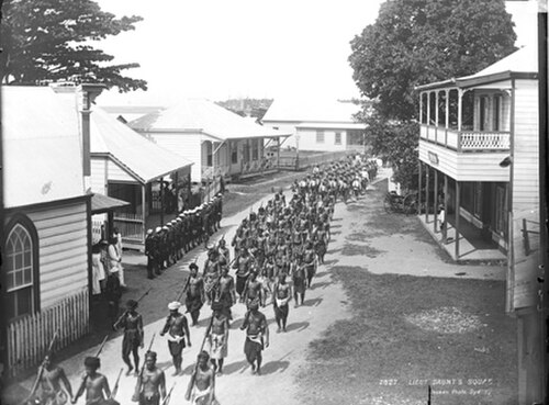 Samoan warriors and American servicemen during the Siege of Apia in March 1899.