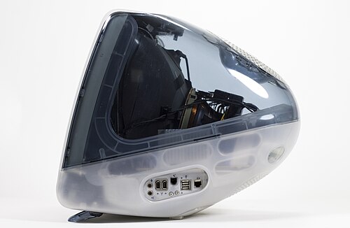صورة جانبية لجهاز iMac بتصميم ألوان رمادي وأبيض شفاف.
