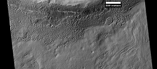 Small, layered structure, as seen by HiRISE under the HiWish program Picture also shows brain terrain forming.