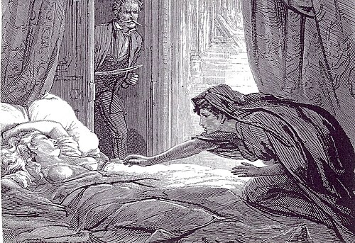 شخص مستلقٍ على سرير بينما شخص آخر يمد يده على السرير نحوه.