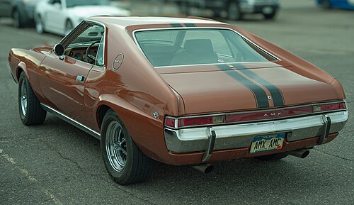 سيارة AMX موديل 1969 مزودة بحزمة Go بلون برتقالي معدني حلو ومر