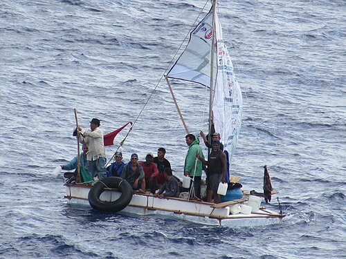 Cuban refugees aboard the Carnival Liberty cruise ship after being rescued at sea, August 2014