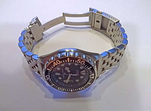 Stainless steel bracelet with opened deployant clasp.