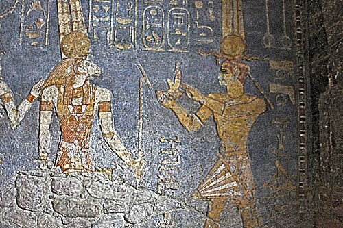 Taharqa making offerings to the ram-headed Apedemak. Temple of Mut, Jebel Barkal.