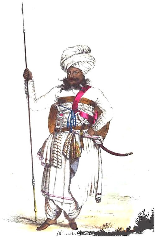 رئيس قبيلة جاديجا يرتدي زي كوتشي خلال عهد ديشالجي الثاني: رسم تخطيطي رُسم عام 1838