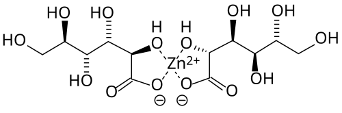 الصيغة الكيميائية الهيكلية لمركب مستوٍ يحتوي على ذرة زنك في المركز، مرتبطة بشكل متناظر بأربع ذرات أكسجين. وترتبط ذرات الأكسجين هذه بدورها بسلاسل خطية من COH.
