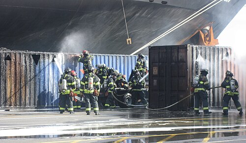 Seattle firefighters put out a cargo container fire in the Port of Seattle.