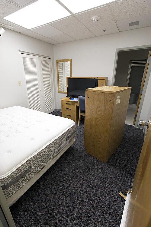 Astronauts sleep prior to launch day in dormitories in the Operations and Checkout Building. In this case a bedroom is undergoing renovations.